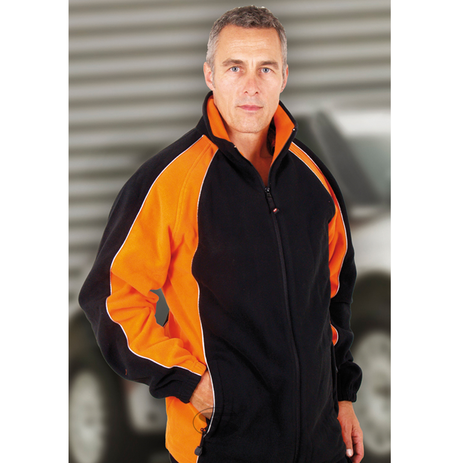 Teamwear Fleecejacke, schwarz/orange